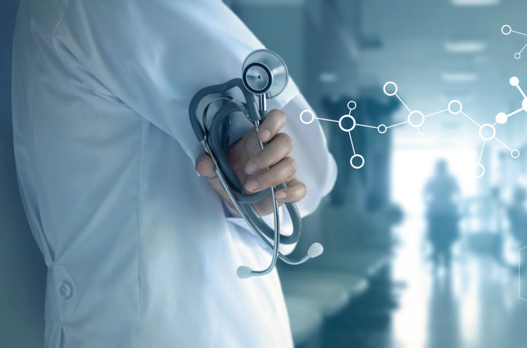 Doctor with stethoscope and white icon medical on hospital background, medical technology network concept